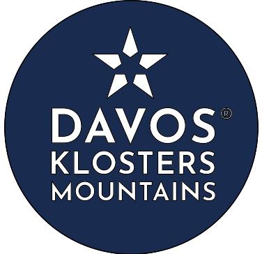 Davos Klosters Mountains Logo im blauen rundem Button | © Davos Klosters Mountains
